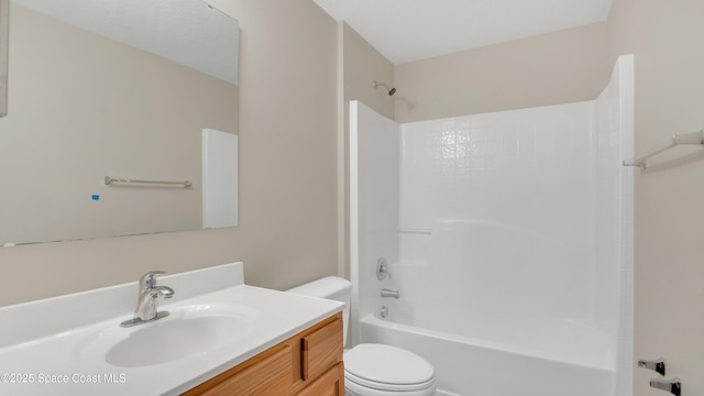 full bathroom with vanity, toilet, and shower / bathtub combination