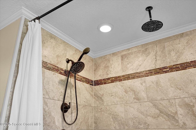 details with ornamental molding, a textured ceiling, and a shower with shower curtain