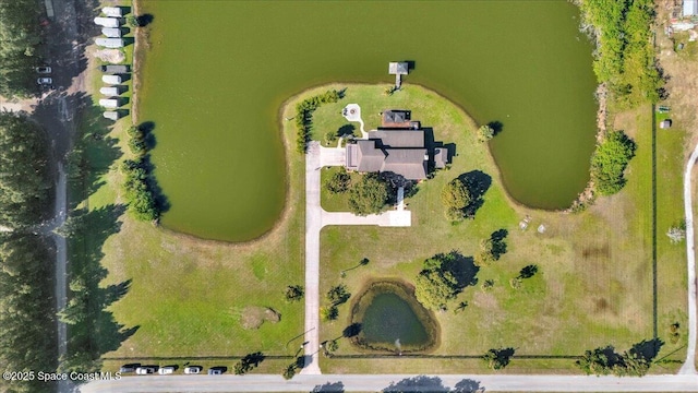 drone / aerial view with a water view