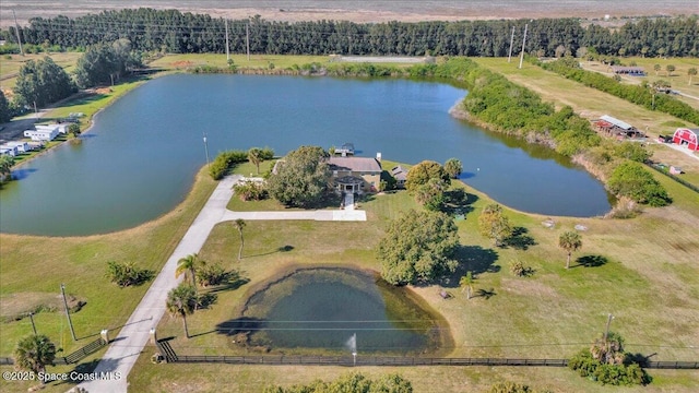 bird's eye view with a water view and a rural view