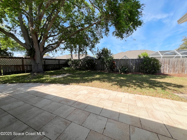 1702 W Shores Rd, Melbourne, FL 32935 - view of patio with a fenced backyard