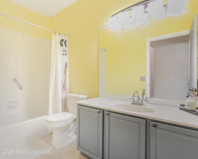 full bathroom with tile patterned floors, toilet, vanity, and shower / tub combo