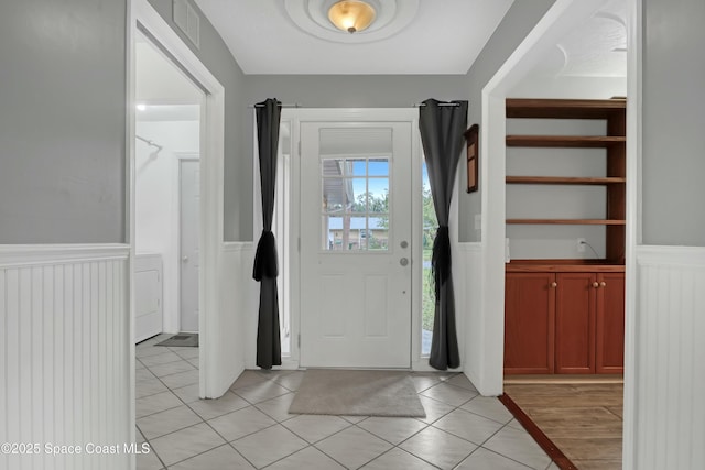 view of tiled foyer entrance