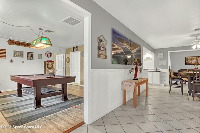 rec room with ceiling fan, light tile patterned floors, and pool table