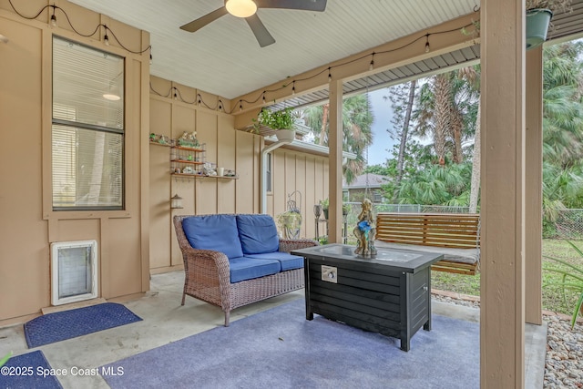 view of patio / terrace with an outdoor living space and ceiling fan