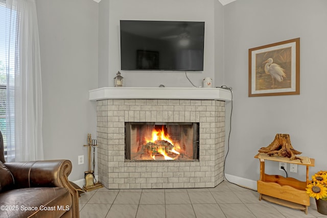 interior details with a brick fireplace