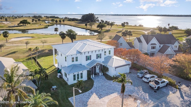 birds eye view of property featuring a water view