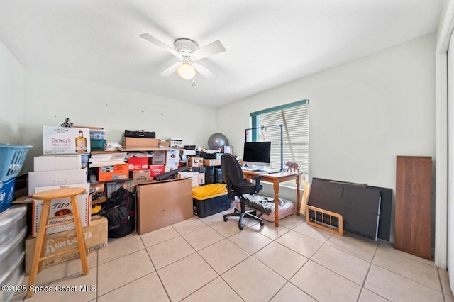 office space featuring a ceiling fan and light tile patterned flooring