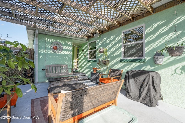 view of patio / terrace featuring a pergola