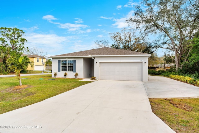 view of front facade with a garage and a front yard