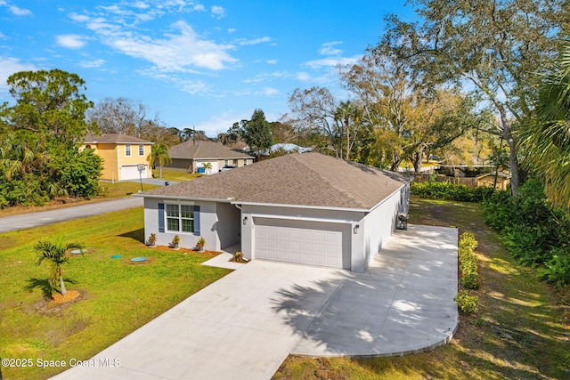 view of front facade featuring a garage and a front lawn