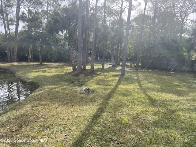 view of yard with fence