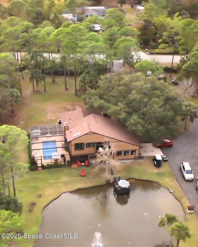 birds eye view of property featuring a water view