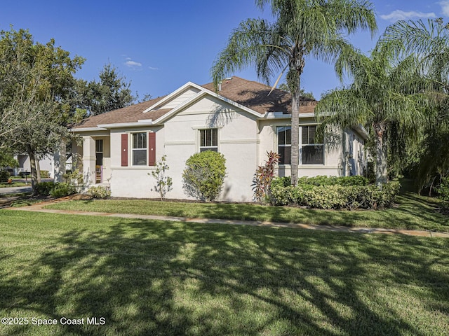 view of front of home with a front yard