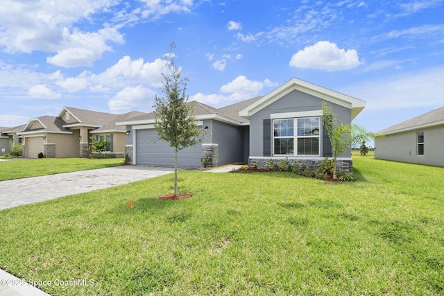 single story home featuring a front yard and a garage