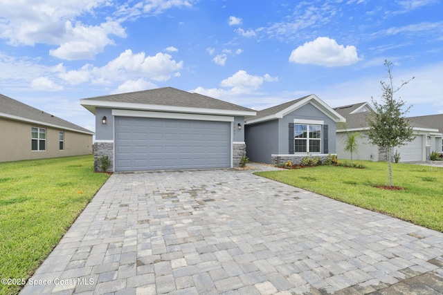 ranch-style house with a garage and a front lawn