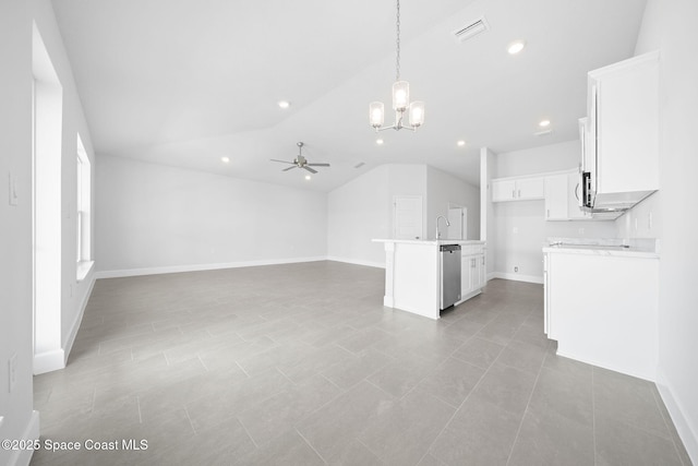 unfurnished living room featuring ceiling fan with notable chandelier, light tile patterned floors, and lofted ceiling