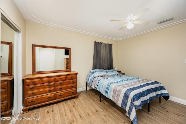 bedroom featuring ceiling fan and light hardwood / wood-style floors