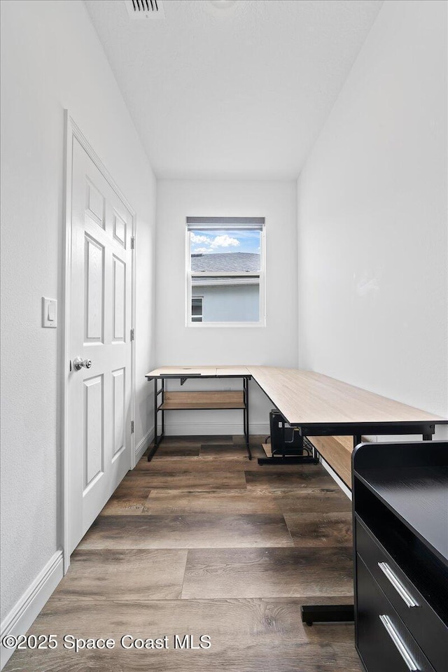 interior space featuring dark wood-type flooring