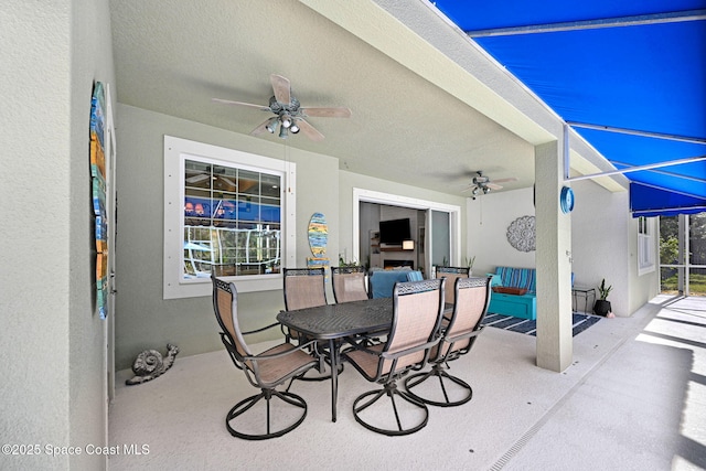 view of patio / terrace featuring ceiling fan