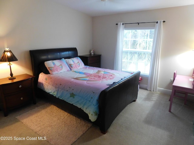 bedroom with light carpet