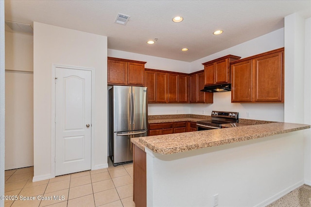 kitchen featuring kitchen peninsula, light tile patterned floors, light stone countertops, and stainless steel appliances