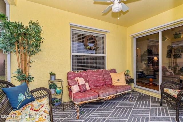 view of patio featuring ceiling fan