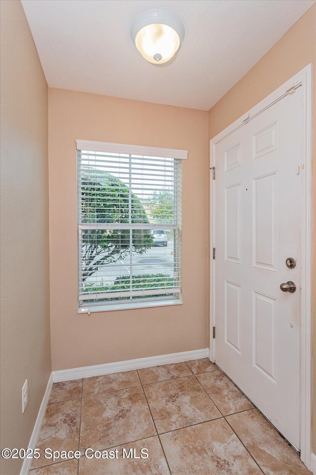 view of tiled entrance foyer