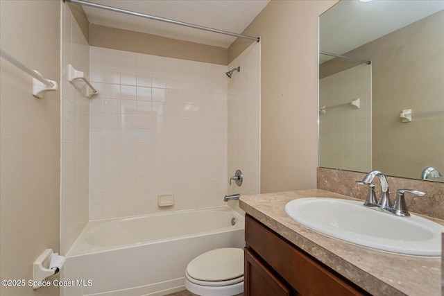 full bathroom featuring toilet, vanity, and bathing tub / shower combination