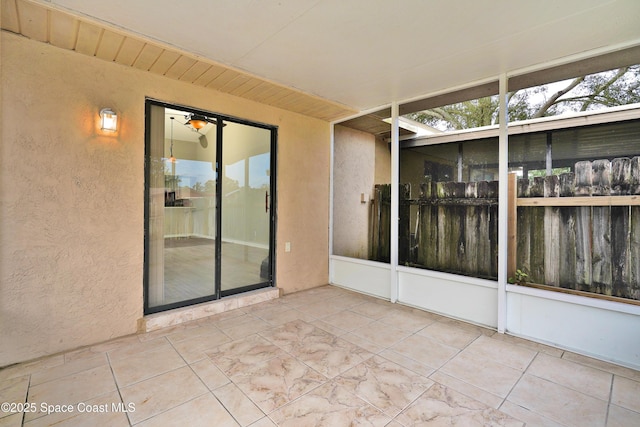 view of unfurnished sunroom