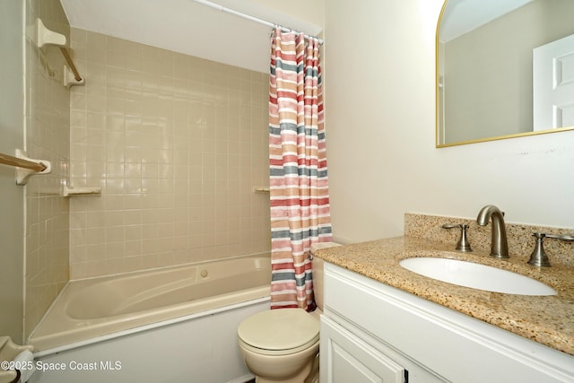 full bathroom featuring vanity, shower / bath combo, and toilet