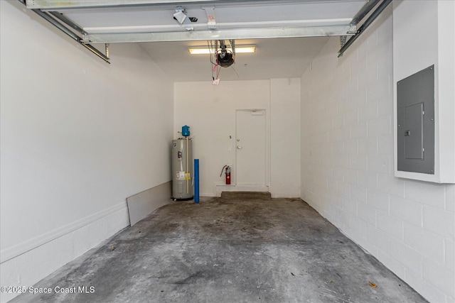 garage featuring electric water heater, a garage door opener, and electric panel