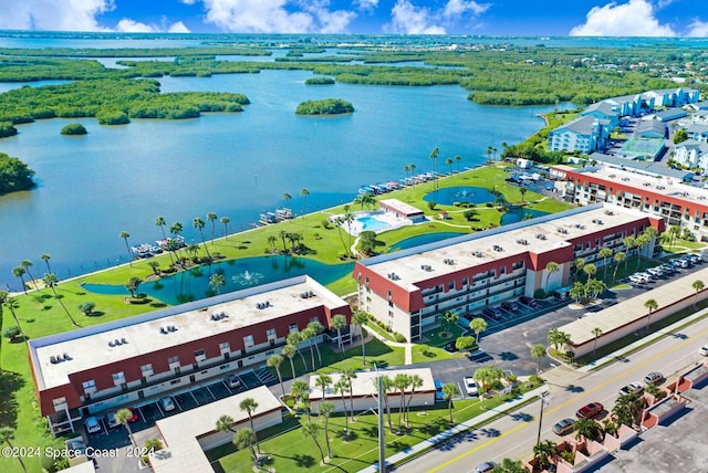 birds eye view of property featuring a water view