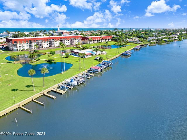 birds eye view of property featuring a water view