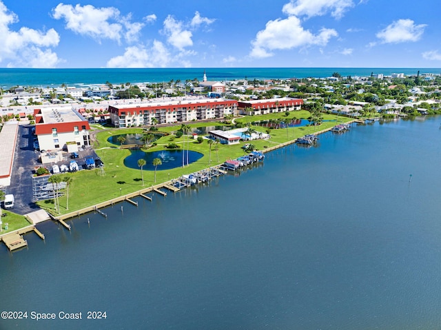 drone / aerial view with a water view