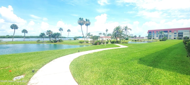 800 S Brevard Ave Unit 222, Cocoa Beach, FL 32931 - view of home's community with a lawn and a water view
