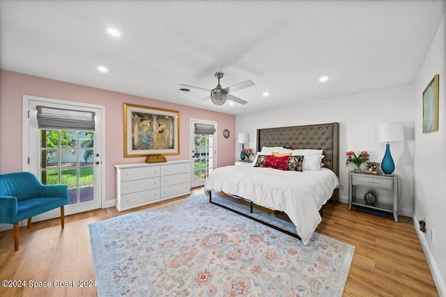 bedroom featuring ceiling fan, access to outside, and light hardwood / wood-style floors