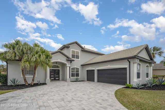 view of front of home with a garage