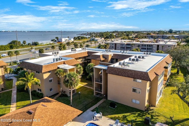 drone / aerial view featuring a water view