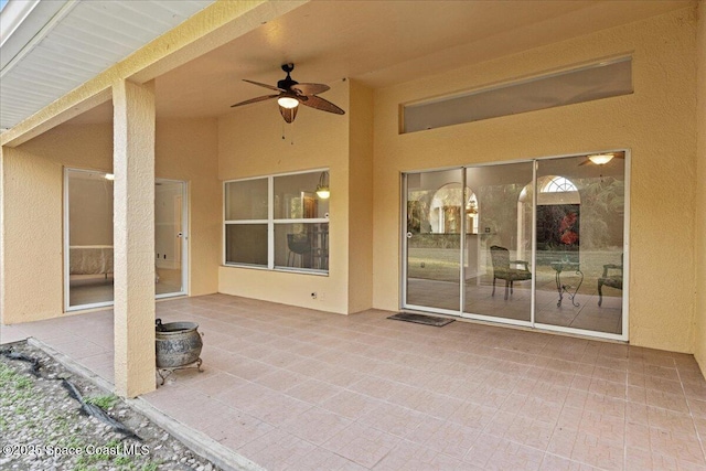 view of patio with ceiling fan