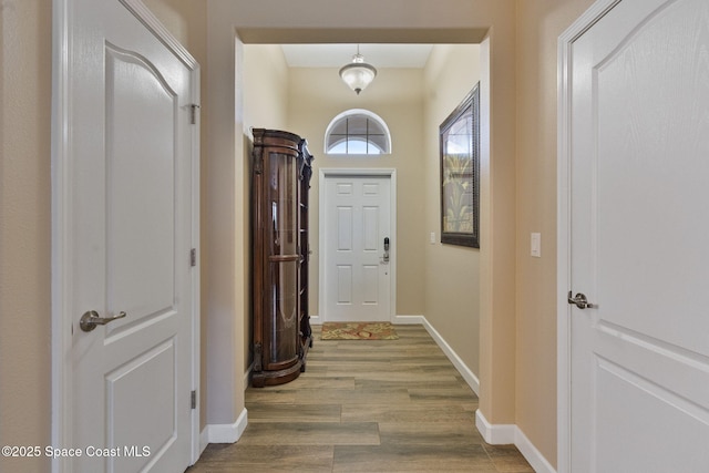 doorway featuring hardwood / wood-style flooring