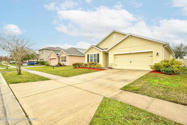 ranch-style house featuring a garage and a front lawn