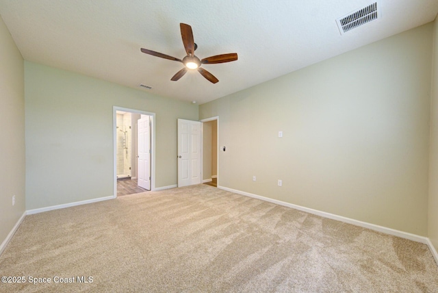 unfurnished bedroom with light carpet and ceiling fan