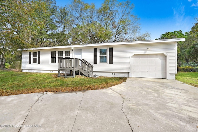 view of front of house with a garage and a front yard