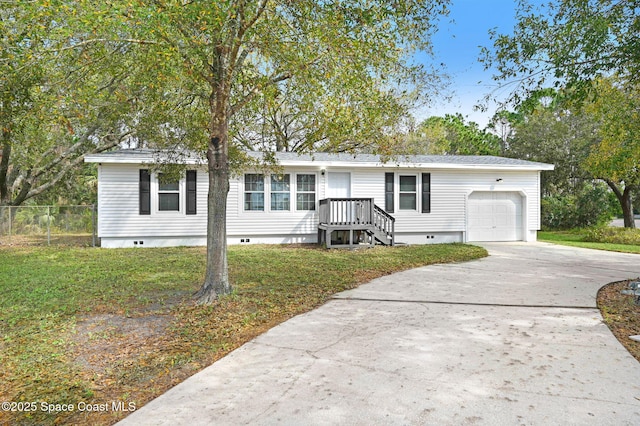 view of front of home with a garage and a front yard