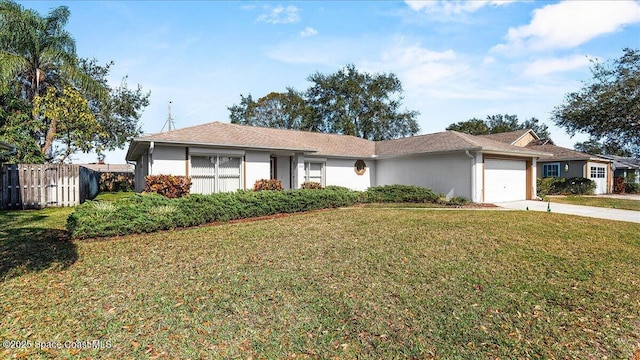 single story home with a garage, concrete driveway, fence, a front lawn, and stucco siding