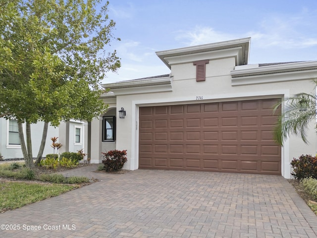 view of front of home featuring a garage