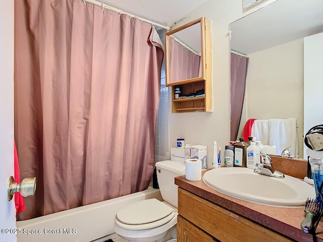 full bathroom featuring vanity, toilet, and shower / bath combo