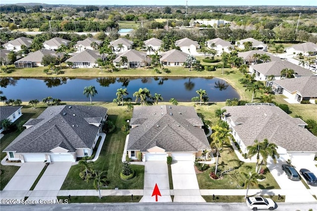 aerial view featuring a water view