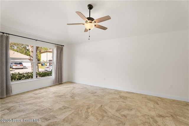 empty room featuring ceiling fan